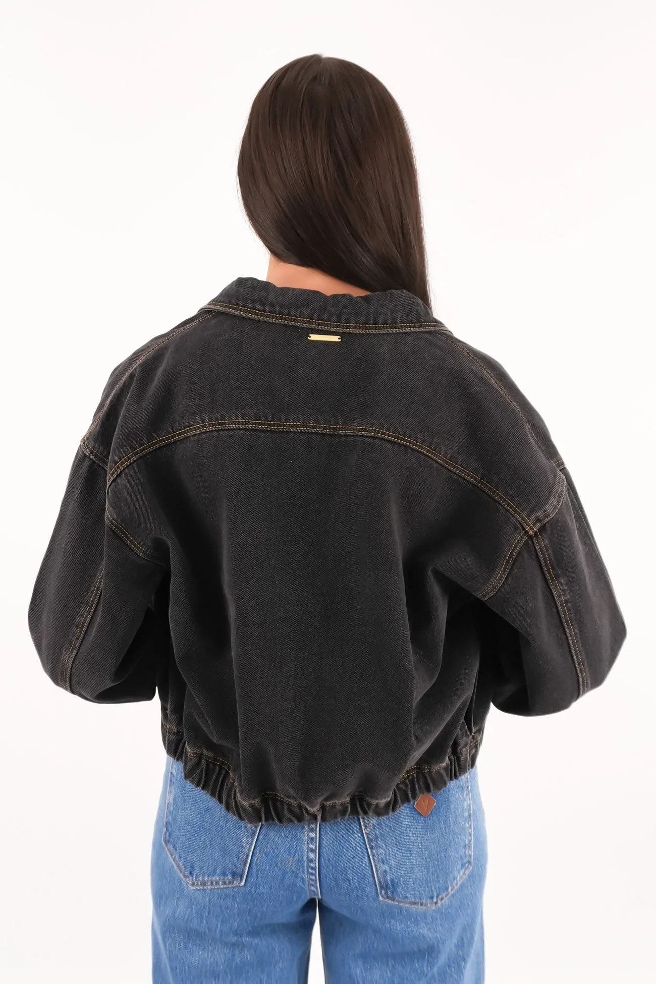 A Denim Bomber Jacket Cara Multi Pocket Layout Modern Drop Tail Hem
