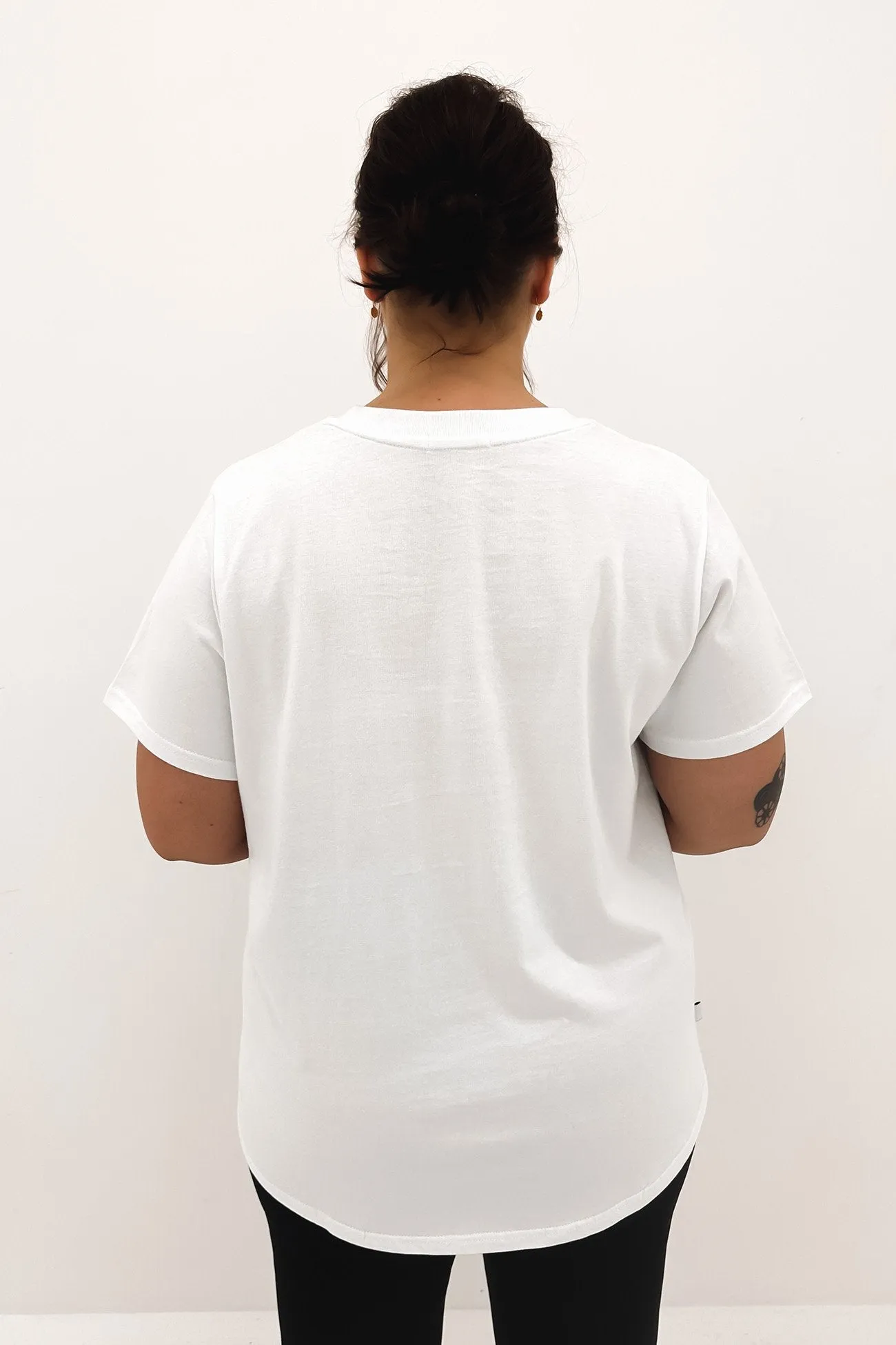 Non Restrictive Silhouette JNJL Embroidered Logo Tee White