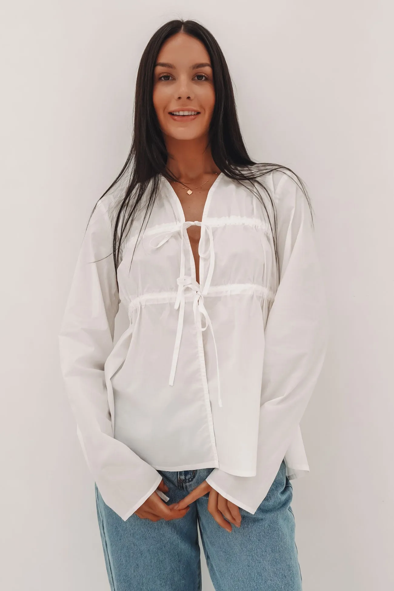 Serenity Long Sleeve Top White lined Tagless Neck Design