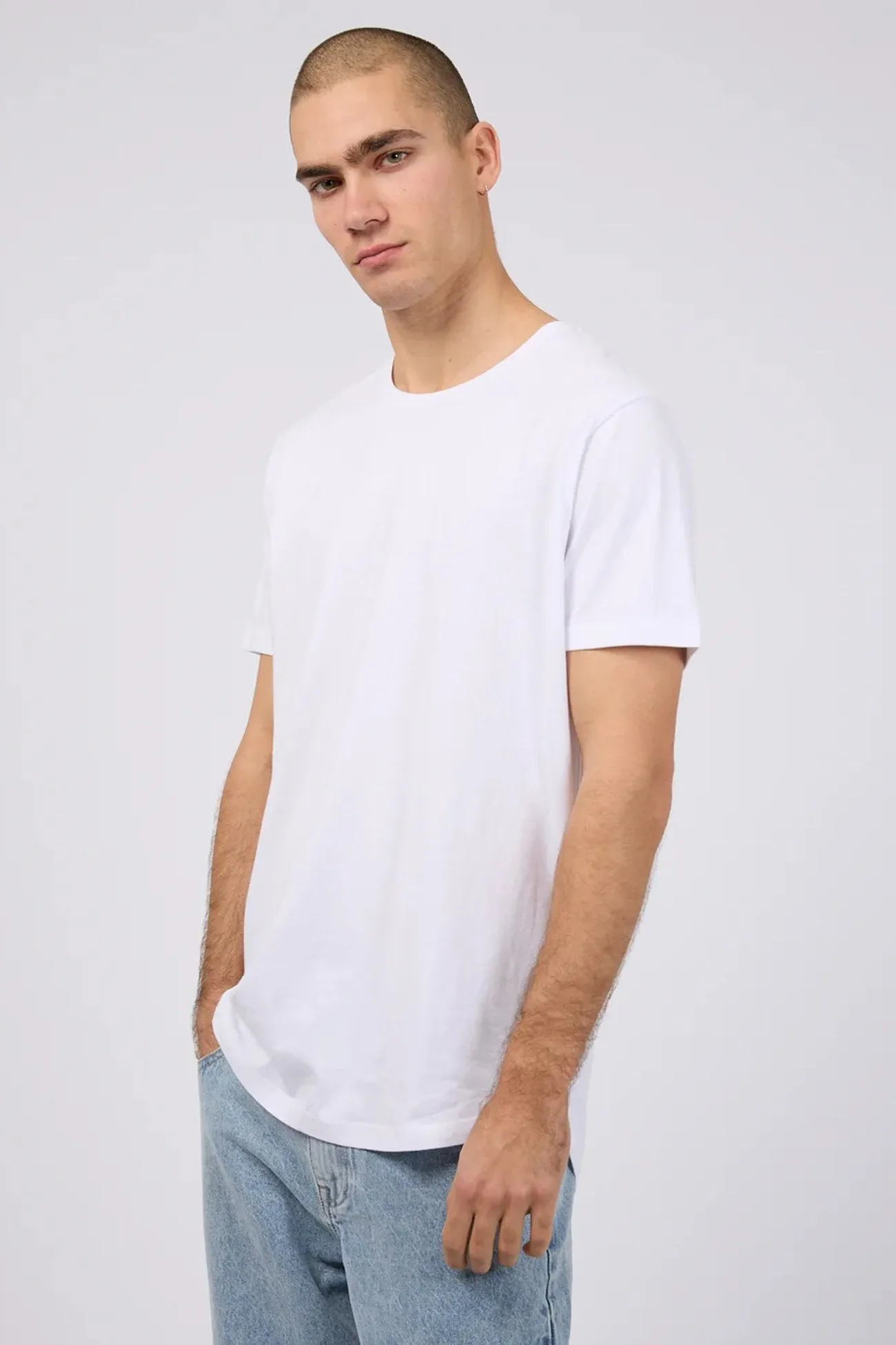 comfortable option loose but not baggy Tail Tee White